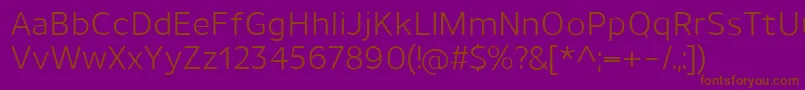 フォントUnimanRegular – 紫色の背景に茶色のフォント