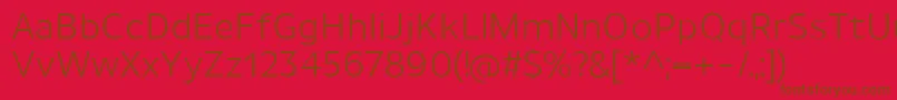 UnimanRegular-fontti – ruskeat fontit punaisella taustalla