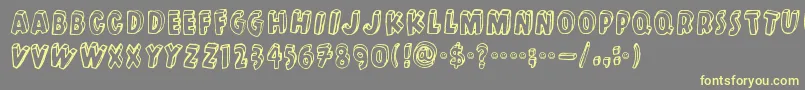 Kulminoituva Font – Yellow Fonts on Gray Background