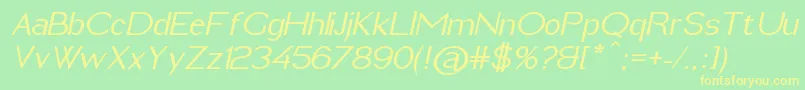 ImeldaMediumItalic-fontti – keltaiset fontit vihreällä taustalla