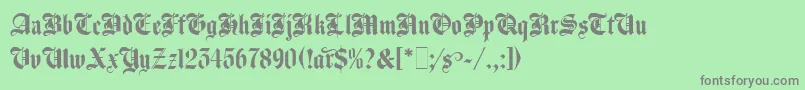 AgincourtLetPlain.1.0 Font – Gray Fonts on Green Background