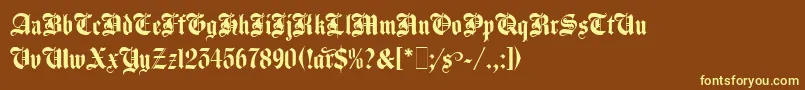 AgincourtLetPlain.1.0 Font – Yellow Fonts on Brown Background