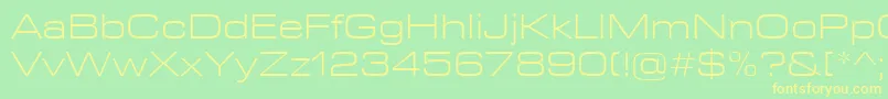 フォントEurostileNextLtComLightExtended – 黄色の文字が緑の背景にあります