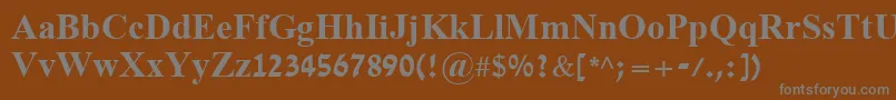 DavidBold-fontti – harmaat kirjasimet ruskealla taustalla