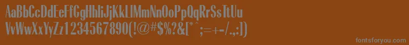 RadiantBoldCondensedRegular-fontti – harmaat kirjasimet ruskealla taustalla