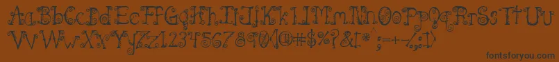 Spahrtygirl Font – Black Fonts on Brown Background