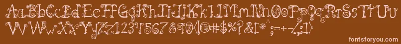 Шрифт Spahrtygirl – розовые шрифты на коричневом фоне