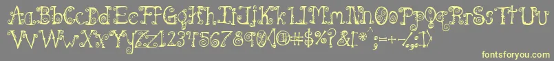 Spahrtygirl Font – Yellow Fonts on Gray Background