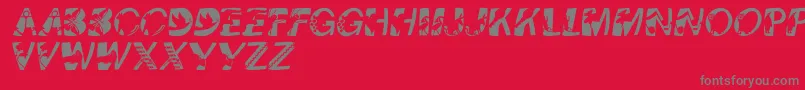 Pixcapswinding Font – Gray Fonts on Red Background