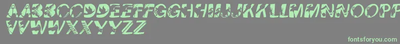 Pixcapswinding Font – Green Fonts on Gray Background