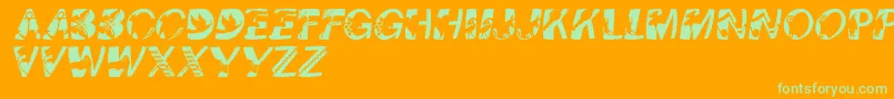 Pixcapswinding Font – Green Fonts on Orange Background