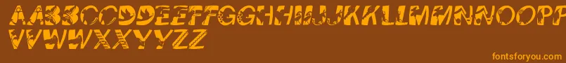 Pixcapswinding Font – Orange Fonts on Brown Background