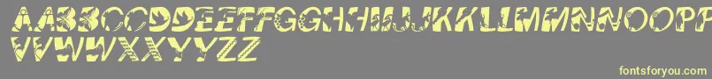 Pixcapswinding Font – Yellow Fonts on Gray Background