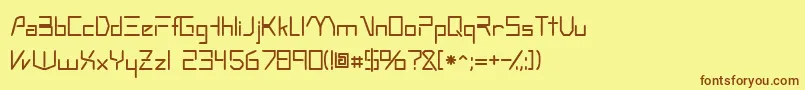 フォントOscillossk – 茶色の文字が黄色の背景にあります。