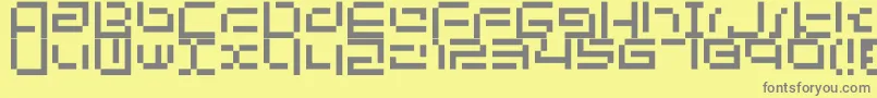 Bit03.Urbanfluxer-fontti – harmaat kirjasimet keltaisella taustalla