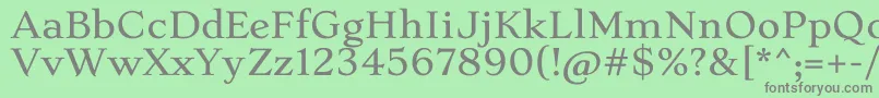 フォントStokeLight – 緑の背景に灰色の文字