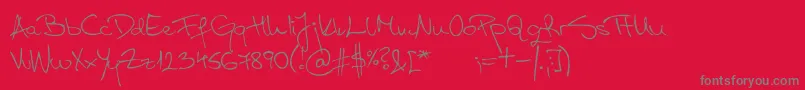 フォントAspadesRegular – 赤い背景に灰色の文字