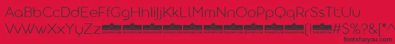 Czcionka AristotelicaDisplayExtralightTrial – czarne czcionki na czerwonym tle