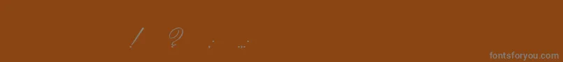 Czcionka Imperial – szare czcionki na brązowym tle