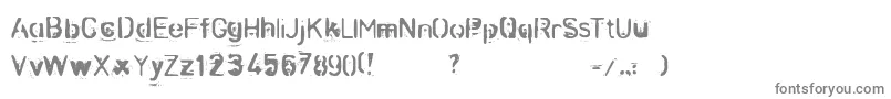 フォントZombnze – 白い背景に灰色の文字