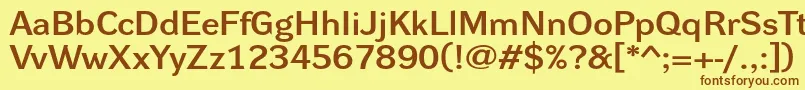 フォントDynagrotesklxeBold – 茶色の文字が黄色の背景にあります。