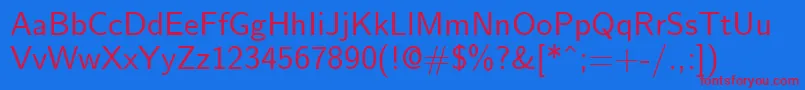 EmilRegular Font – Red Fonts on Blue Background