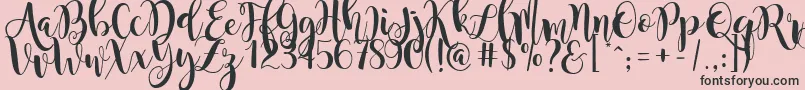 MagnoliaSky-Schriftart – Schwarze Schriften auf rosa Hintergrund