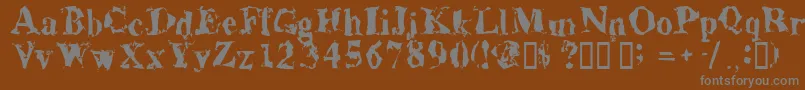 Aluminumshred-fontti – harmaat kirjasimet ruskealla taustalla