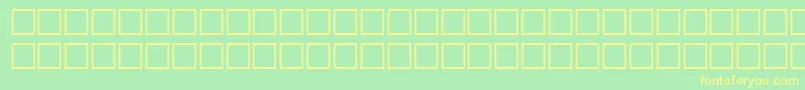 フォントMcsKhaybarSIFissured. – 黄色の文字が緑の背景にあります