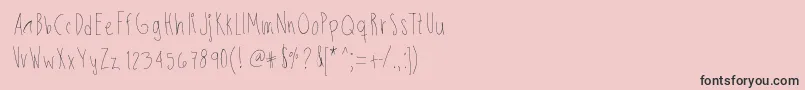 フォントSkinnybitch – ピンクの背景に黒い文字