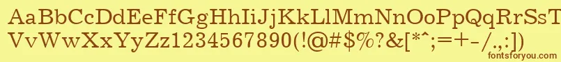 Journalctt Font – Brown Fonts on Yellow Background