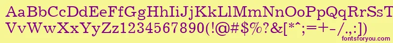 Journalctt Font – Purple Fonts on Yellow Background