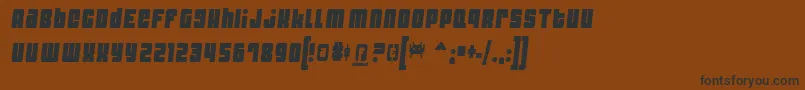 フォントDynost – 黒い文字が茶色の背景にあります