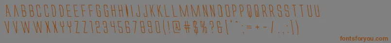 Alienleagueleft-Schriftart – Braune Schriften auf grauem Hintergrund