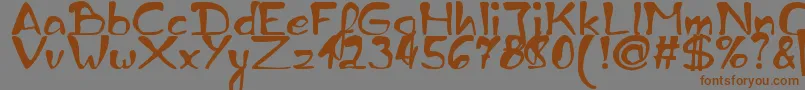 ZaiEdsloppyhandwritten-Schriftart – Braune Schriften auf grauem Hintergrund
