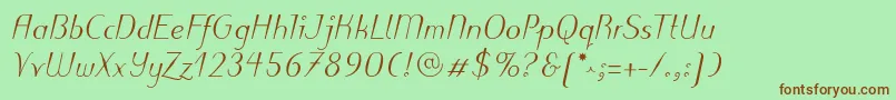 PuritasLtMediumItalic-fontti – ruskeat fontit vihreällä taustalla