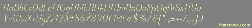 PuritasLtMediumItalic-fontti – keltaiset fontit harmaalla taustalla