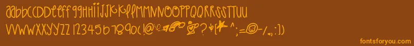フォントThatpaper – オレンジ色の文字が茶色の背景にあります。