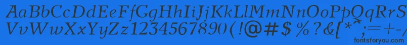 Czcionka NewJournalItalic.001.001 – czarne czcionki na niebieskim tle