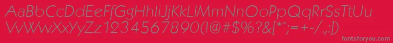KoblenzserialXlightItalic-Schriftart – Graue Schriften auf rotem Hintergrund