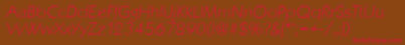 KoblenzserialXlightItalic-fontti – punaiset fontit ruskealla taustalla