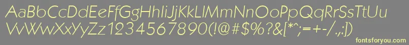 KoblenzserialXlightItalic-fontti – keltaiset fontit harmaalla taustalla