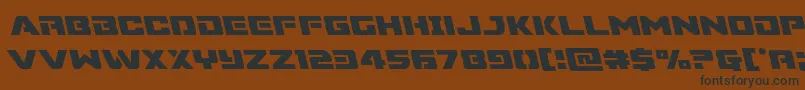 Supercommandoleft-Schriftart – Schwarze Schriften auf braunem Hintergrund