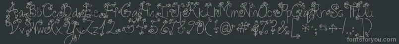 Jandaswirlytwirly-Schriftart – Graue Schriften auf schwarzem Hintergrund