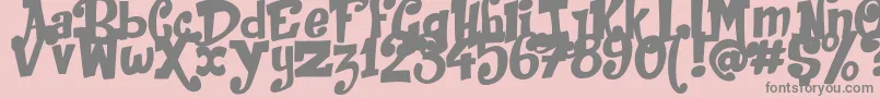 JackInTheBox-Schriftart – Graue Schriften auf rosa Hintergrund