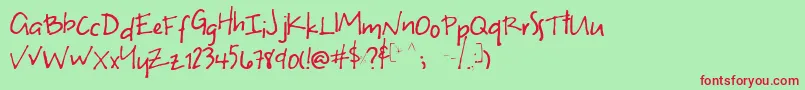SUneven-Schriftart – Rote Schriften auf grünem Hintergrund