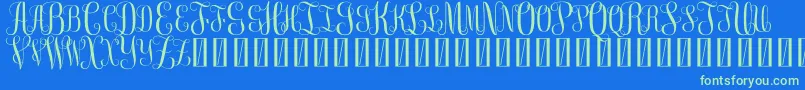 FreemonogramBeta0.5-Schriftart – Grüne Schriften auf blauem Hintergrund