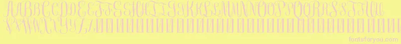 FreemonogramBeta0.5-Schriftart – Rosa Schriften auf gelbem Hintergrund