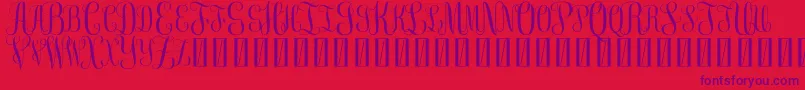 FreemonogramBeta0.5-Schriftart – Violette Schriften auf rotem Hintergrund