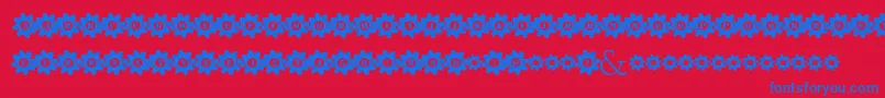 StuckedInGears-Schriftart – Blaue Schriften auf rotem Hintergrund